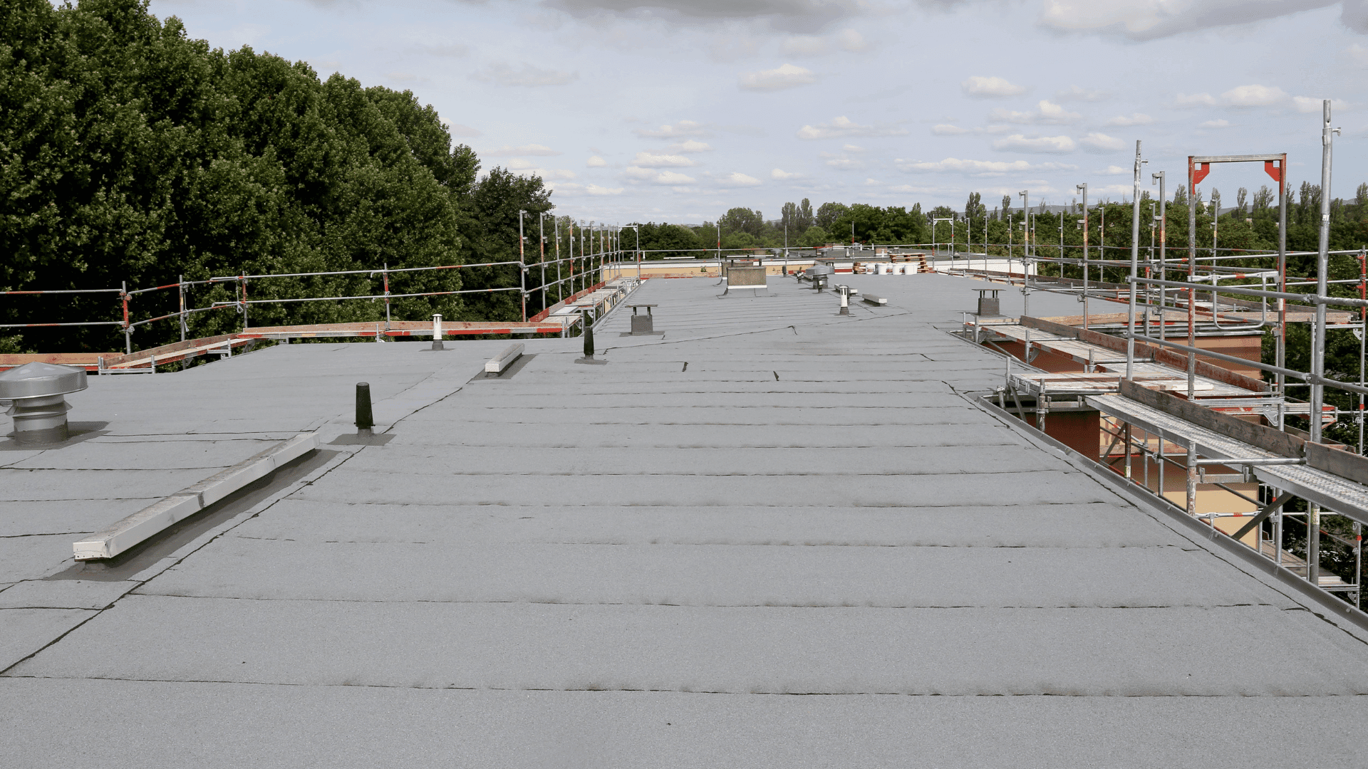 Professional flat roof repairs being carried out in Basingstoke